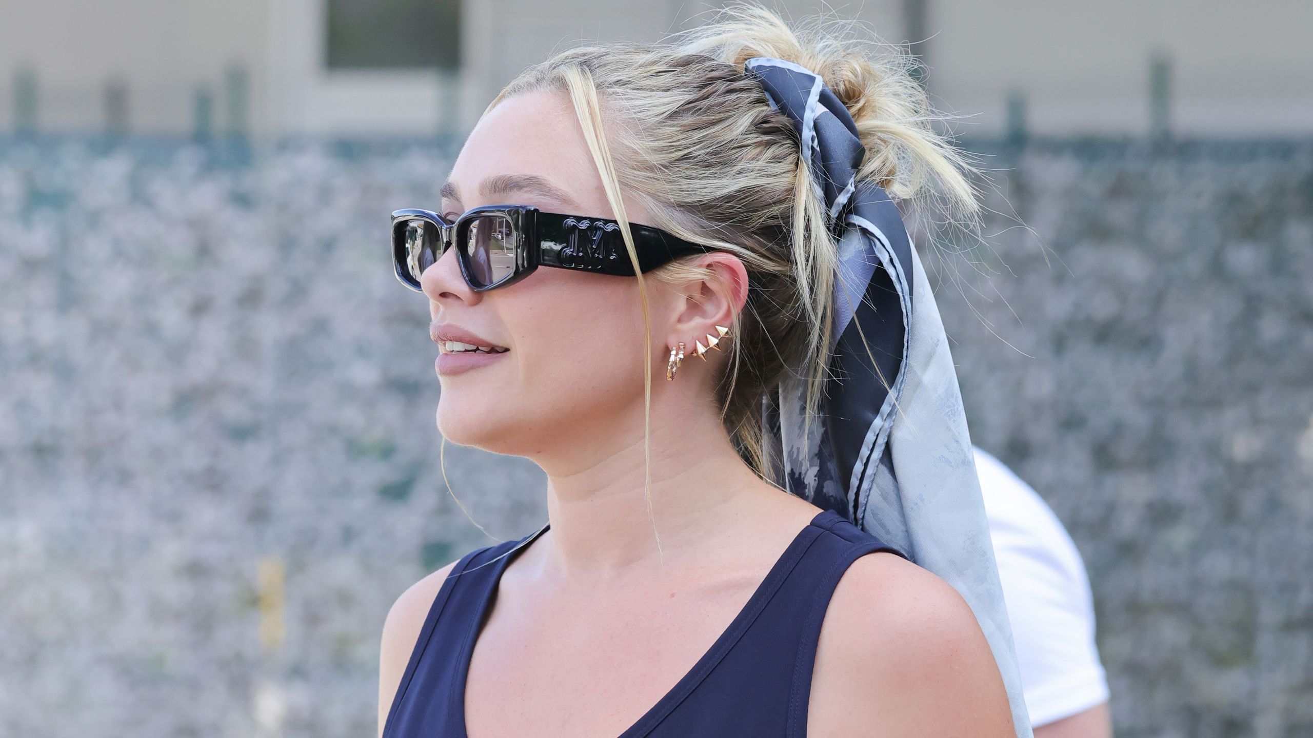 How Florence Pugh Elevated Her Messy Bun With a Silk Scarf